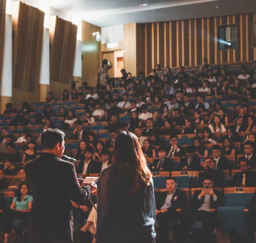 A lecture hall full of poeple