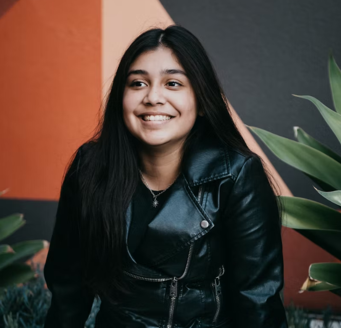 A woman smiling at the camera